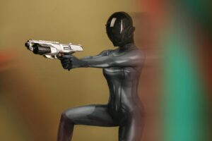 A futuristic female warrior in a sleek design, holding a sci-fi weapon.